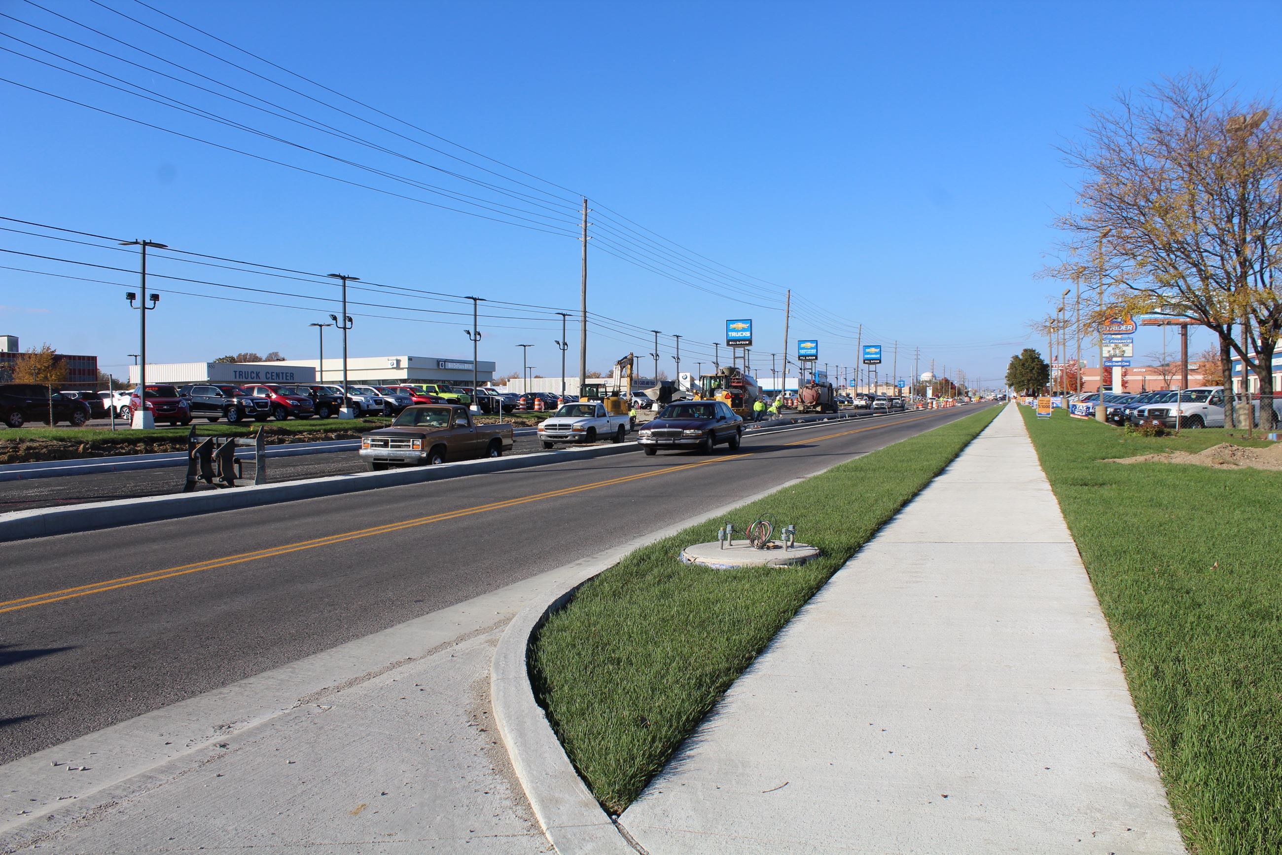 New lanes, sidewalk, curbs, ramps, and landscaping on Sagamore Parkway