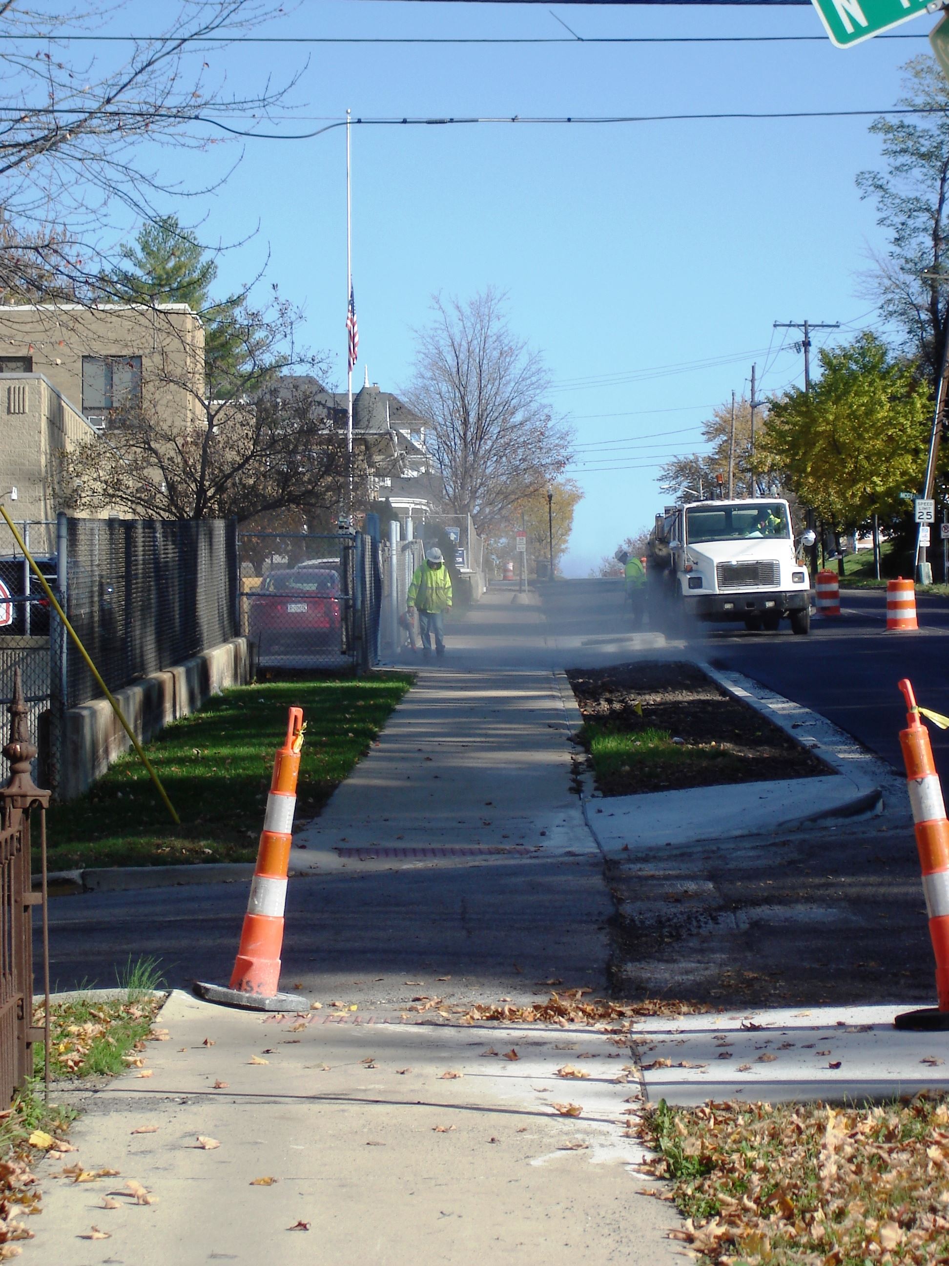 A view looking east on South Street showing curb work in the distance